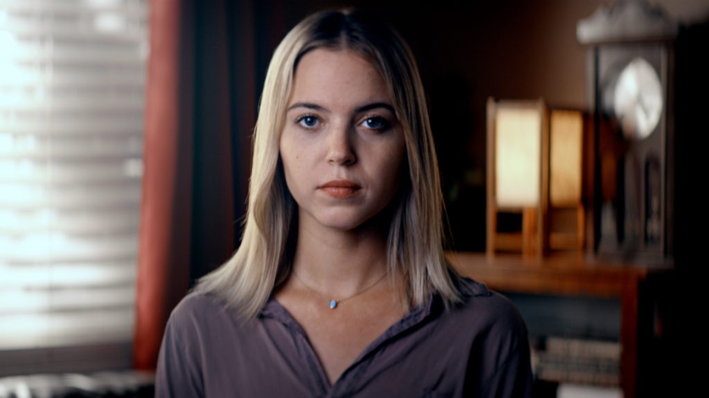 Still of a blonde woman from the A Better Response video