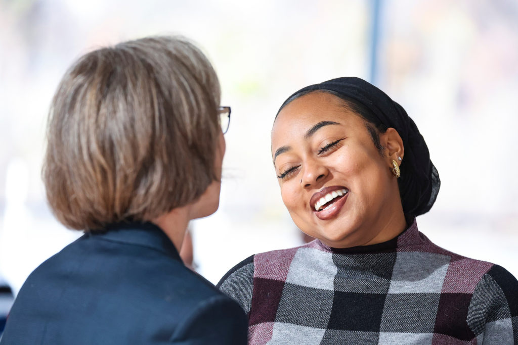 Image from Building Hope Mental Health Strategy Summit, hosted by Inseparable on November 16, 2022. Angela Kimball on the left and Fajr Malika DeLane on the right, talking to each other.